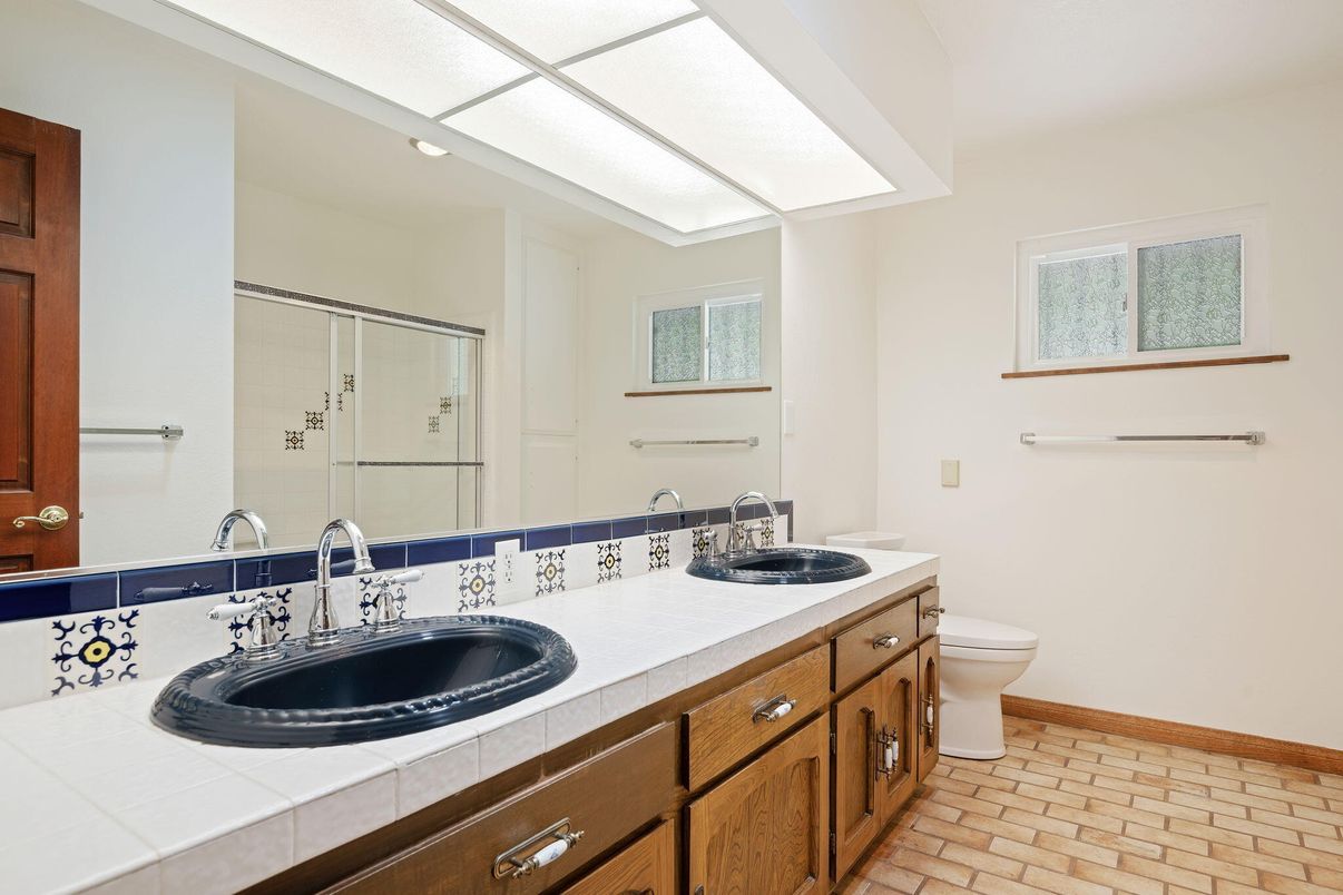 Bathroom, Dual Sink Vanities, Interior, Recessed Lighting, Tile Countertops