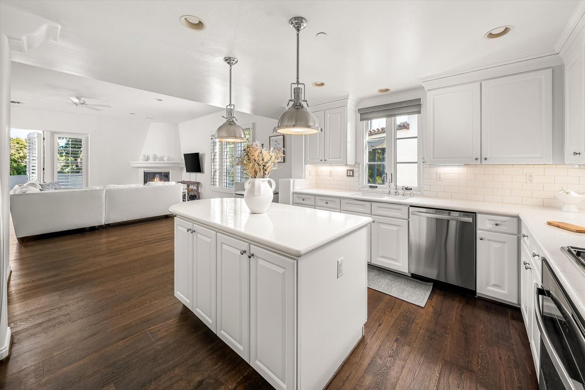 Fireplace, Interior, Kitchen, Living room, Pendant Lights, Recessed Lighting, Stainless Steel Appliances, Wood Texture Flooring