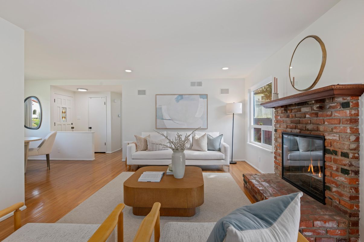 Fireplace, Interior, Living room, Recessed Lighting, Stone Walls, Wood Texture Flooring