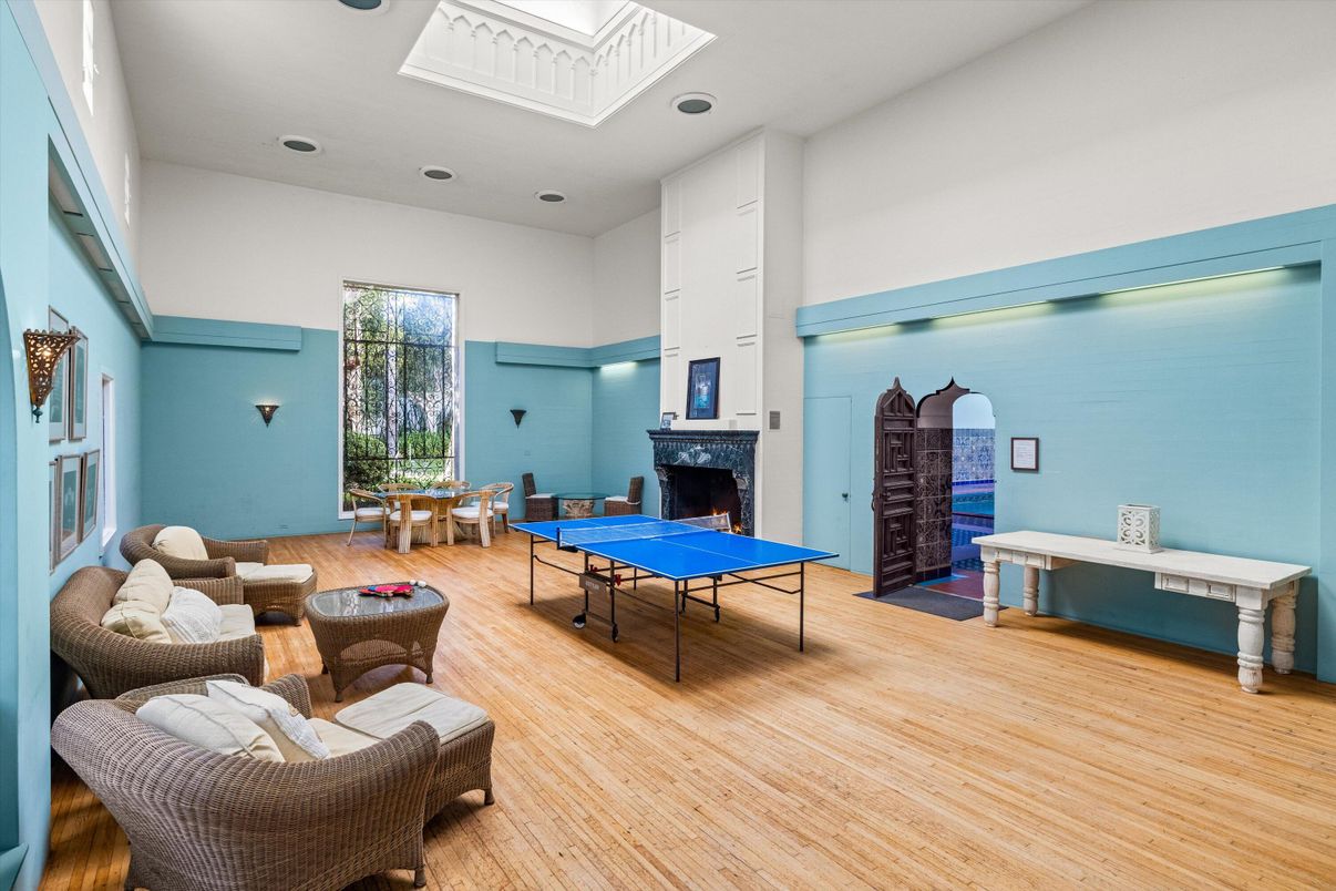 Fireplace, Game Room, Interior, Recessed Lighting, Wood Texture Flooring