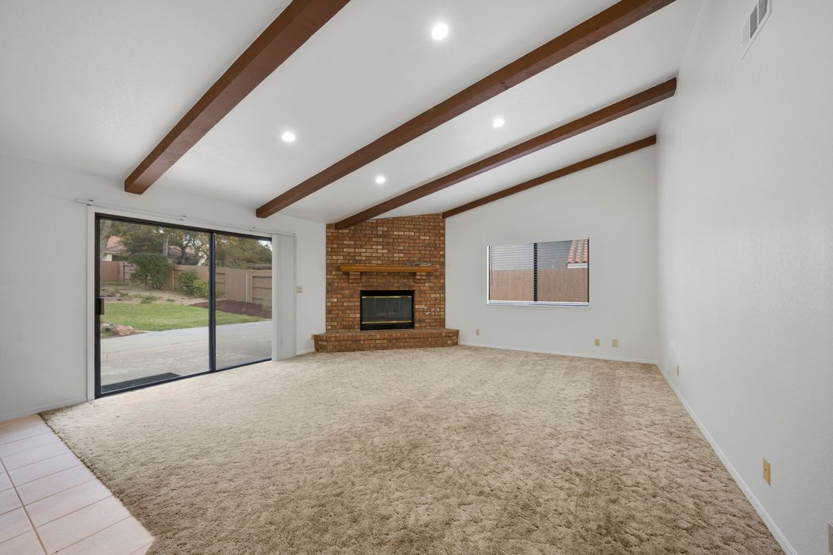 Empty room, Fireplace, Interior, Recessed Lighting, Stone Walls, Wooden Beams