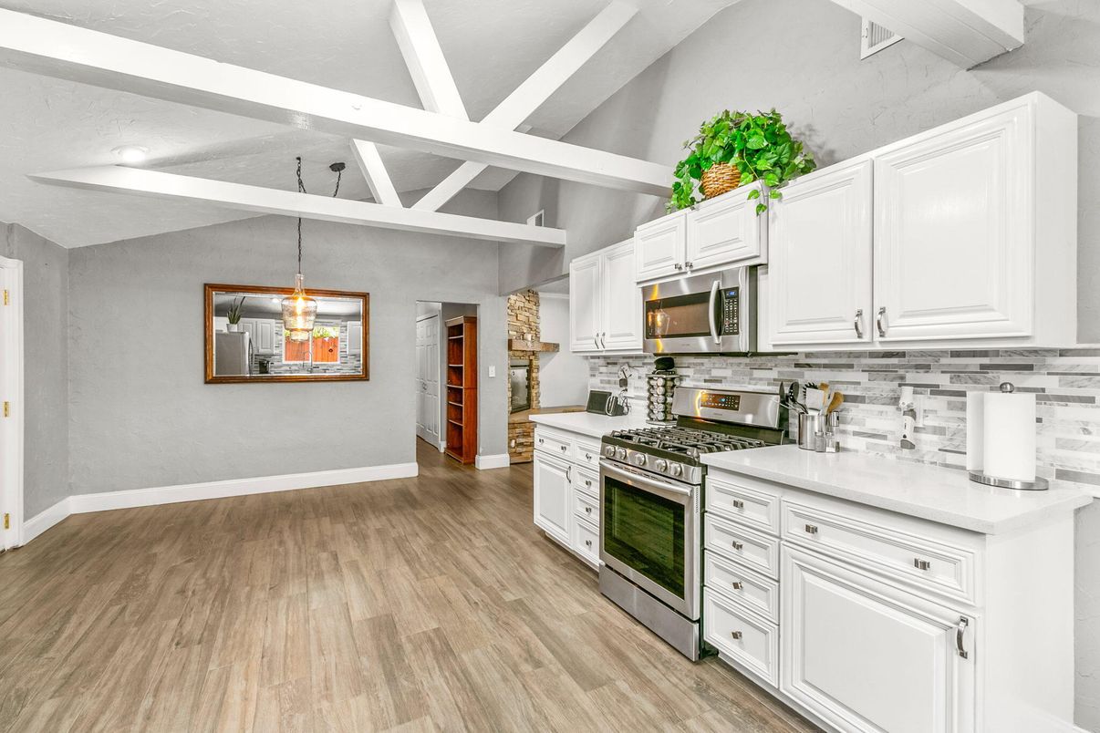 Interior, Kitchen, Pendant Lights, Recessed Lighting, Stainless Steel Appliances, Wood Texture Flooring