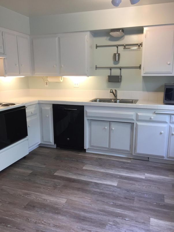 Interior, Kitchen, Tile Countertops, Wood Texture Flooring