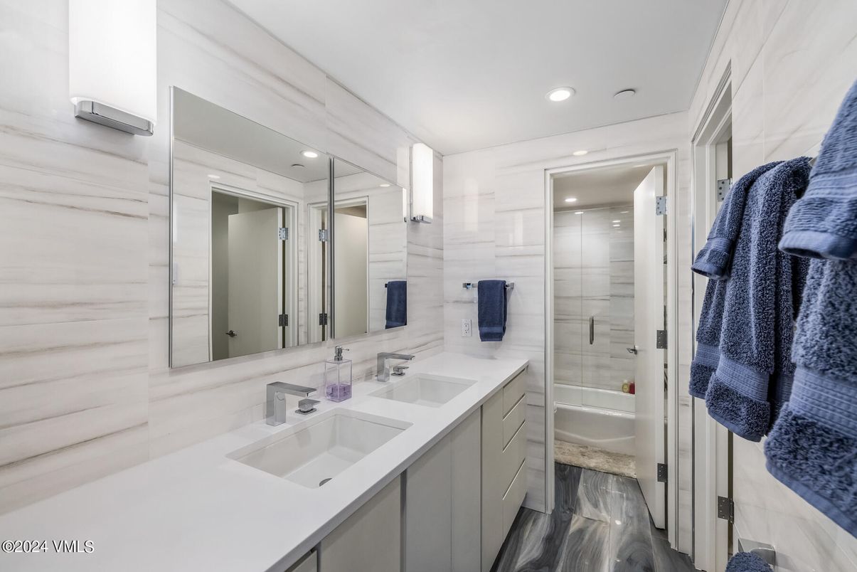 Bathroom, Dual Sink Vanities, Glass Shower, Interior, Recessed Lighting, Wood Texture Flooring