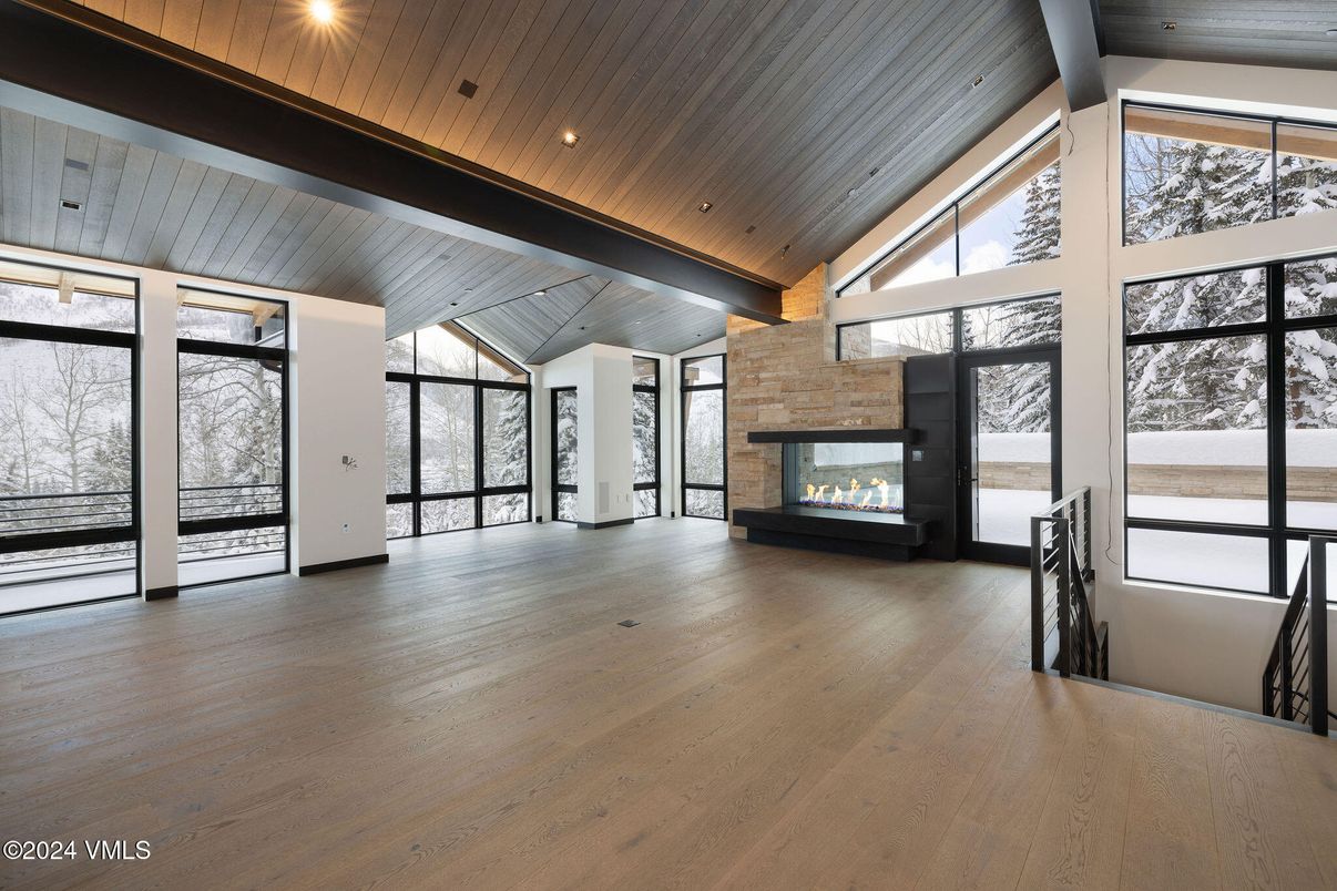 Empty room, Fireplace, Interior, Recessed Lighting, Wooden Beams, Wooden Ceilings, Wood Texture Flooring