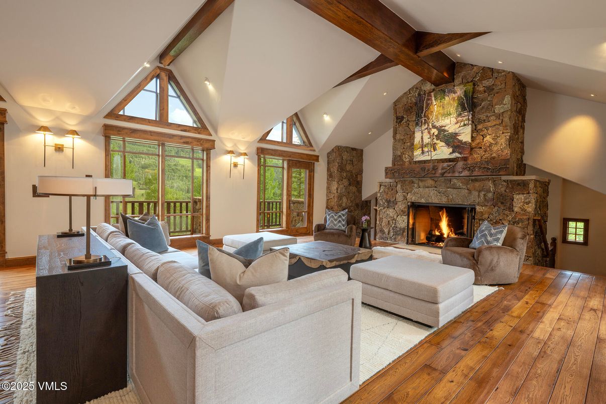 Fireplace, Interior, Living room, Recessed Lighting, Stone Walls, Wooden Beams, Wood Texture Flooring