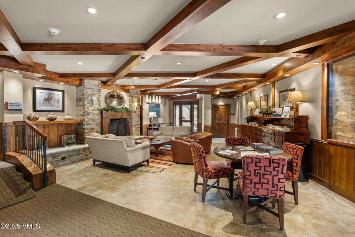 Fireplace, Interior, Living room, Recessed Lighting, Stone Walls, Wooden Beams