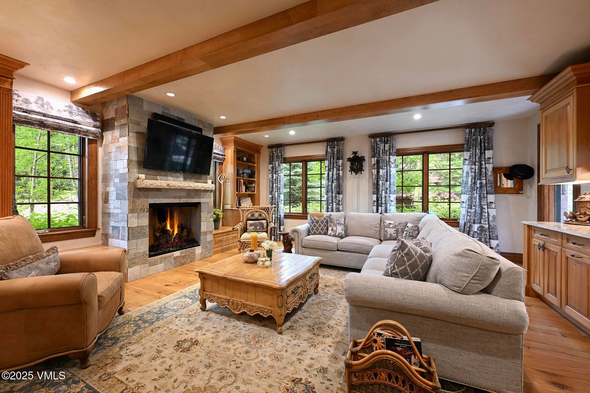 Fireplace, Interior, Living room, Recessed Lighting, Stone Walls, Wooden Beams, Wood Texture Flooring