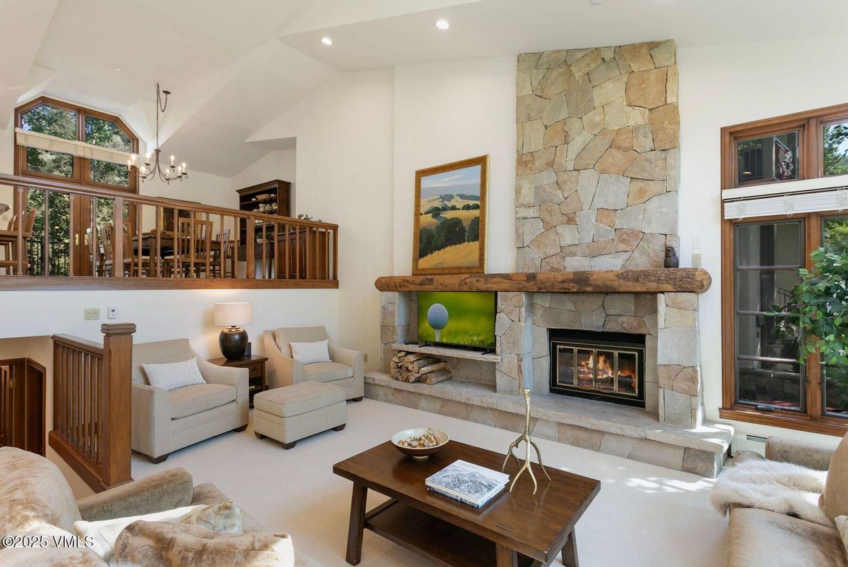 Chandelier, Fireplace, Interior, Living room, Recessed Lighting, Stone Walls