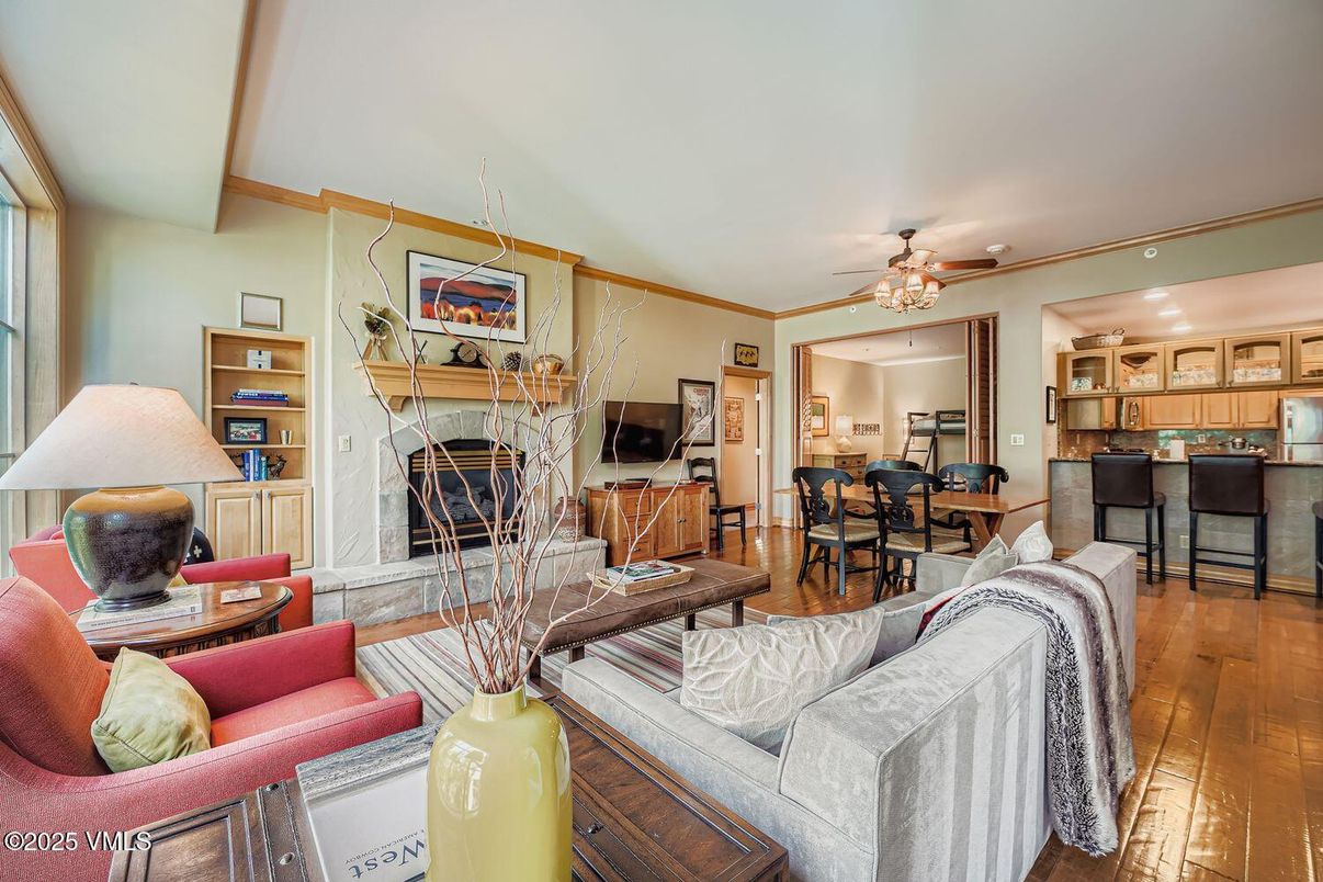 Dining room, Fireplace, Interior, Kitchen, Living room, Recessed Lighting, Wood Texture Flooring