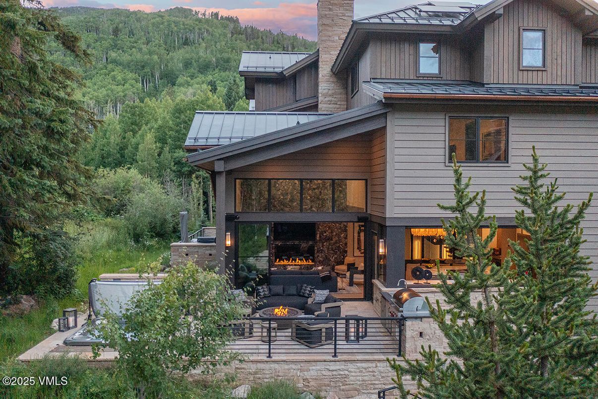 Exterior, Facade, Fireplace, Modern