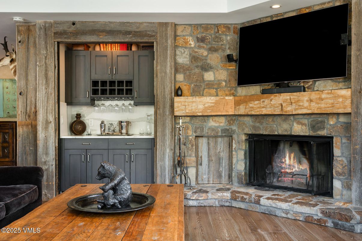 Fireplace, Interior, Recessed Lighting, Stone Walls, Wood Texture Flooring