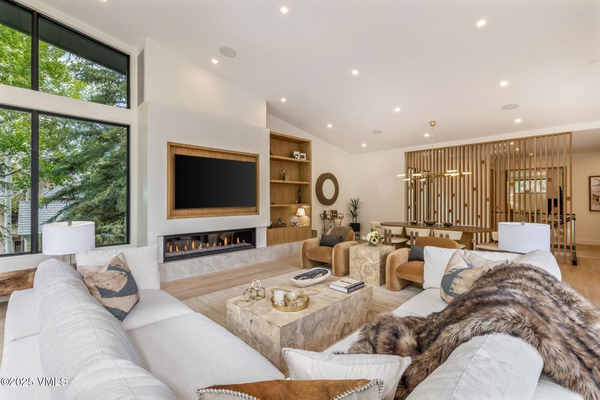 Dining room, Fireplace, Interior, Living room, Pendant Lights, Recessed Lighting, Wood Texture Flooring