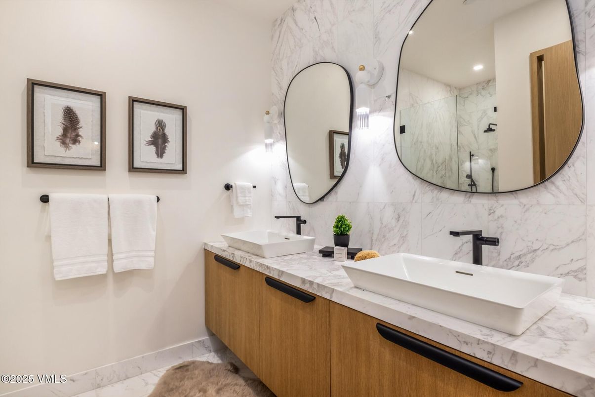 Bathroom, Dual Sink Vanities, Interior, Marble, Marble Walls, Recessed Lighting