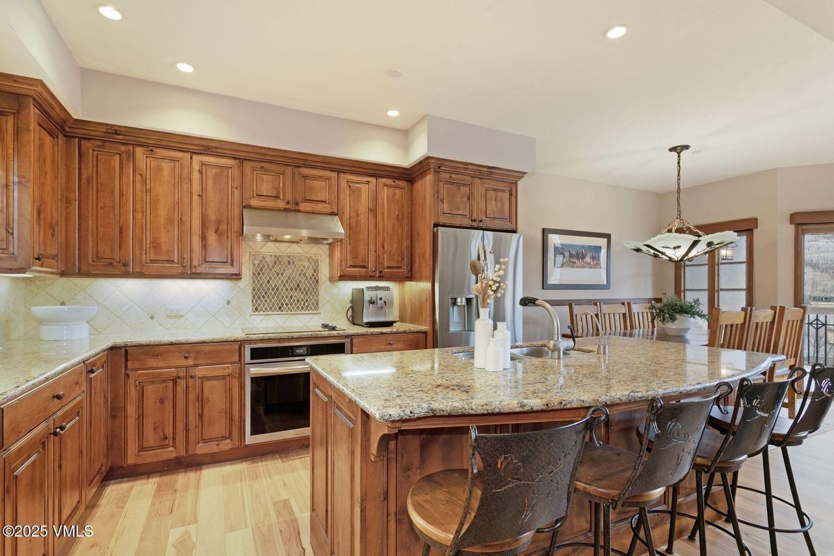 Dining room, Interior, Kitchen, Pendant Lights, Recessed Lighting, Stainless Steel Appliances, Wood Texture Flooring