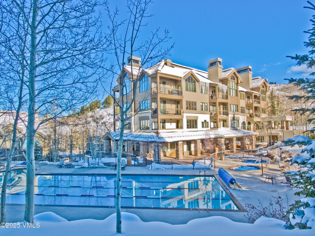 Backyard, Exterior, Facade, Pool, Condo Building