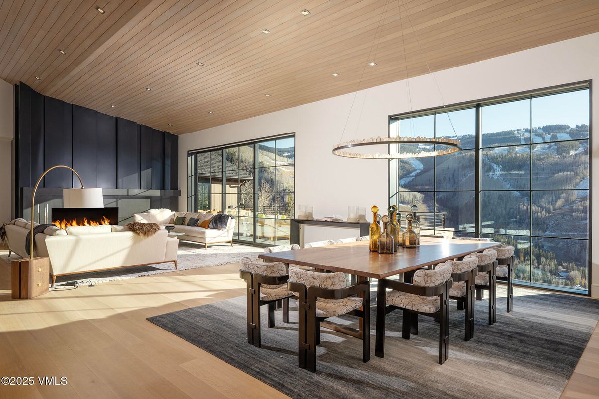 Dining room, Fireplace, Interior, Living room, Pendant Lights, Recessed Lighting, Wooden Ceilings, Wood Texture Flooring