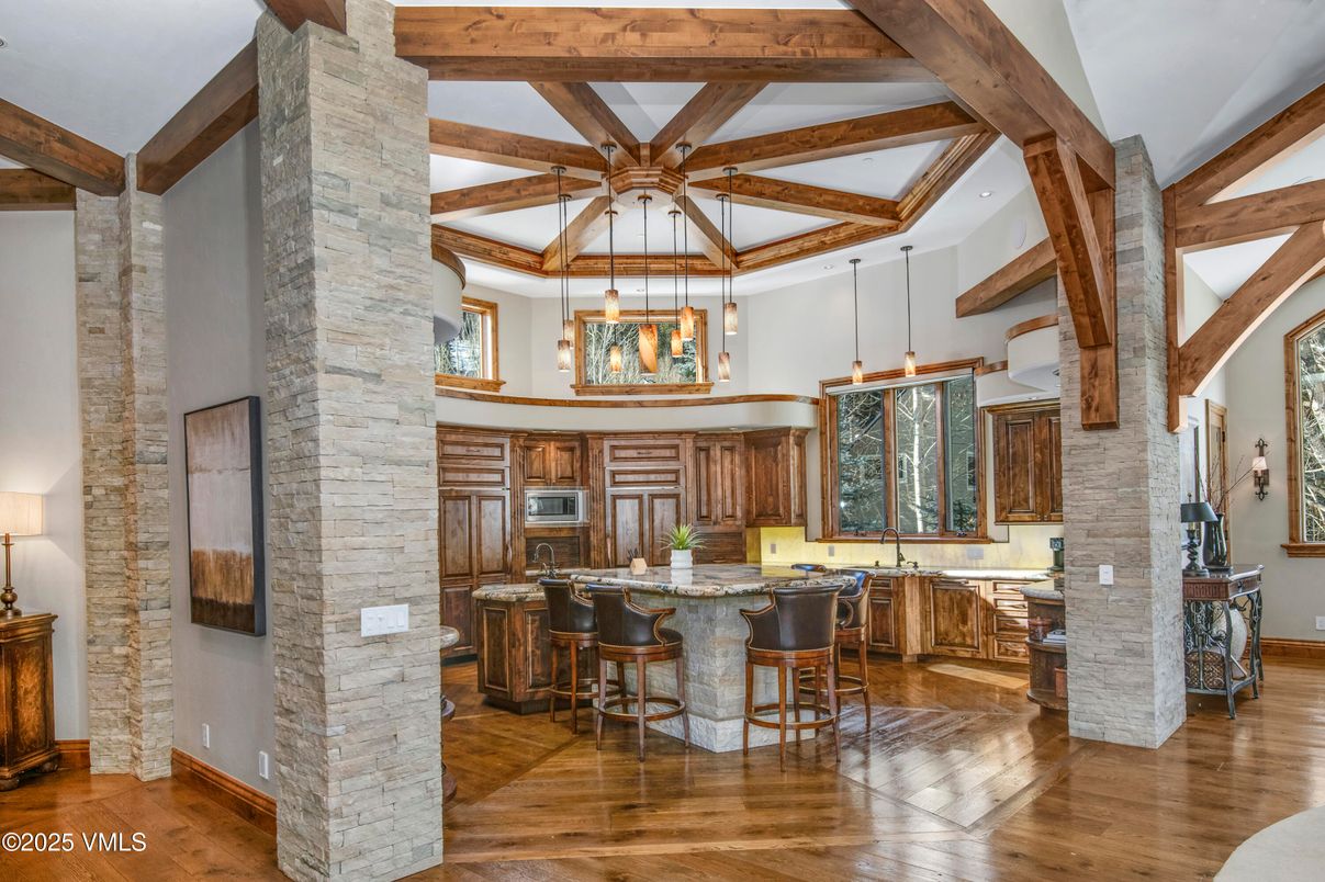 Interior, Kitchen, Pendant Lights, Recessed Lighting, Stainless Steel Appliances, Stone Walls, Wooden Beams, Wood Texture Flooring