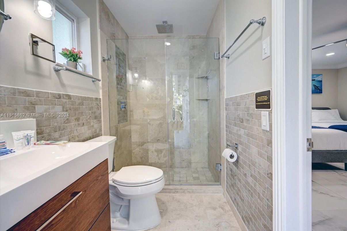 Bathroom, Glass Shower, Interior, Recessed Lighting, Stone Walls