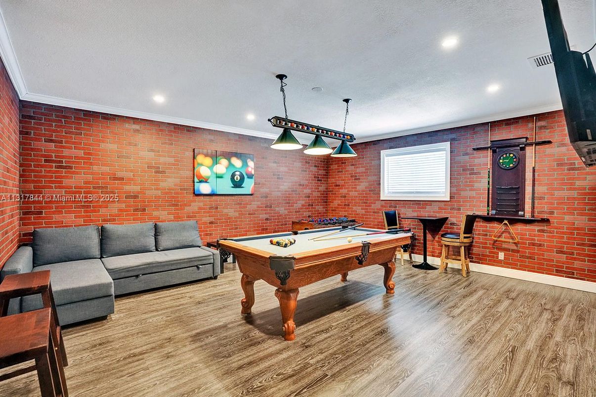 Billiard Table, Game Room, Interior, Pendant Lights, Recessed Lighting, Stone Walls, Wood Texture Flooring