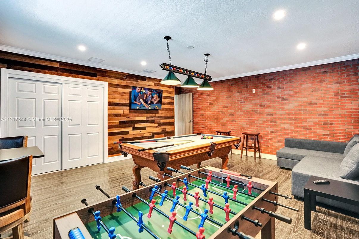 Billiard Table, Game Room, Interior, Pendant Lights, Recessed Lighting, Stone Walls, Wood Texture Flooring, Wooden Walls