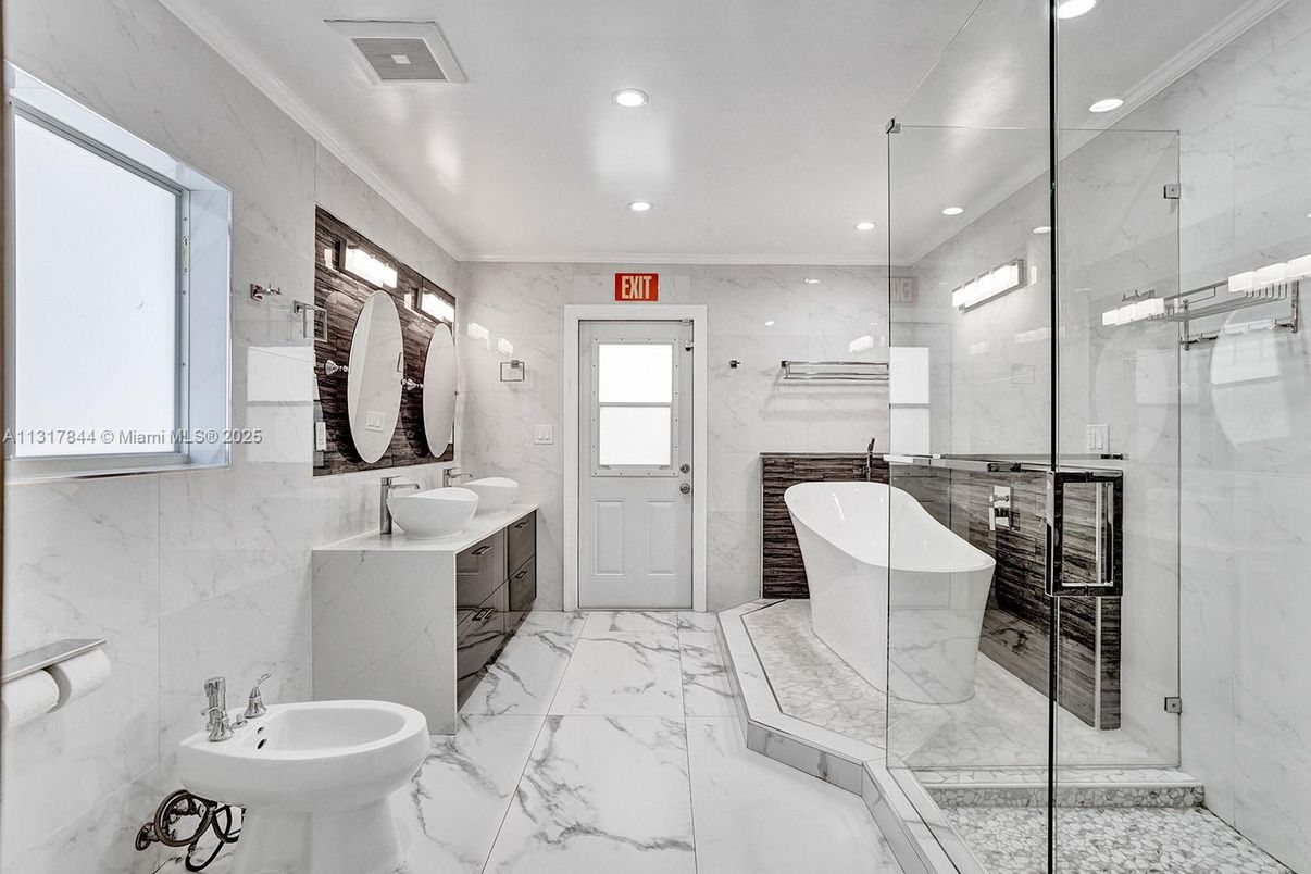 Bathroom, Dual Sink Vanities, Free Standing Baths, Glass Shower, Interior, Marble, Marble Walls, Recessed Lighting