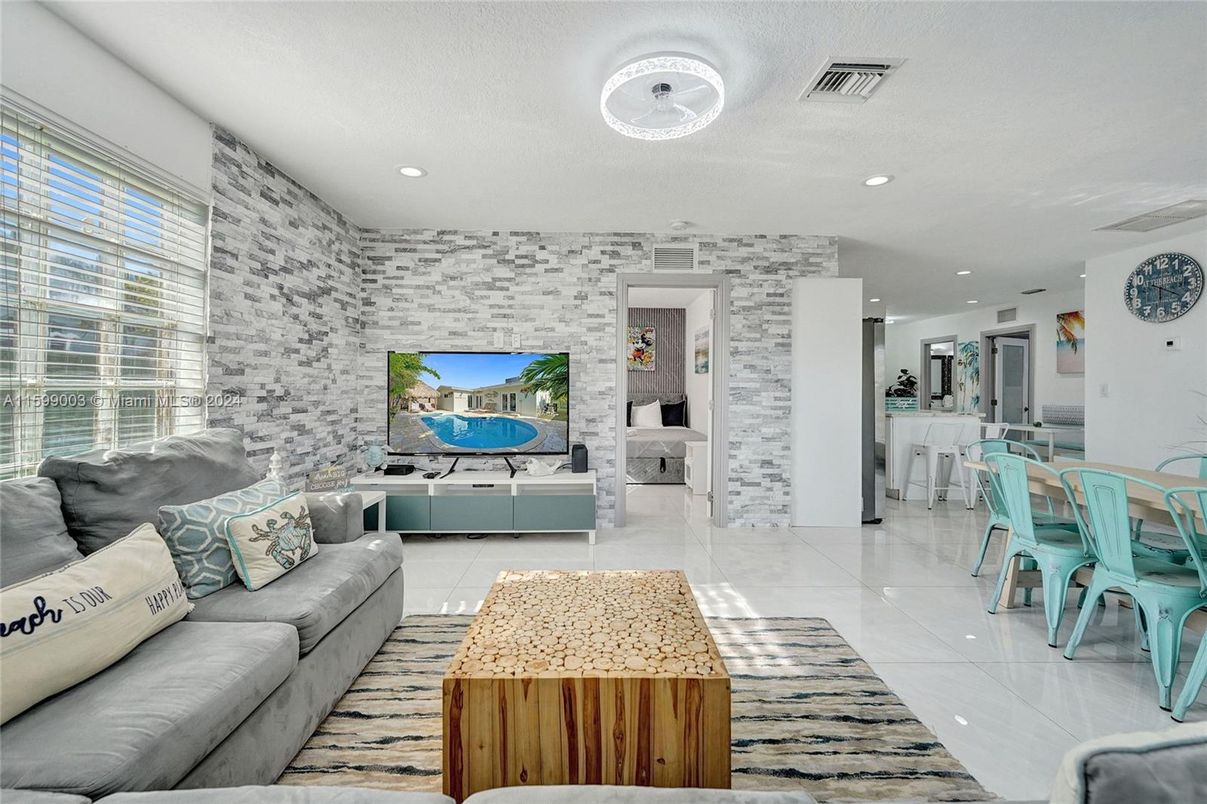 Dining room, Fireplace, Interior, Living room, Recessed Lighting, Stone Walls