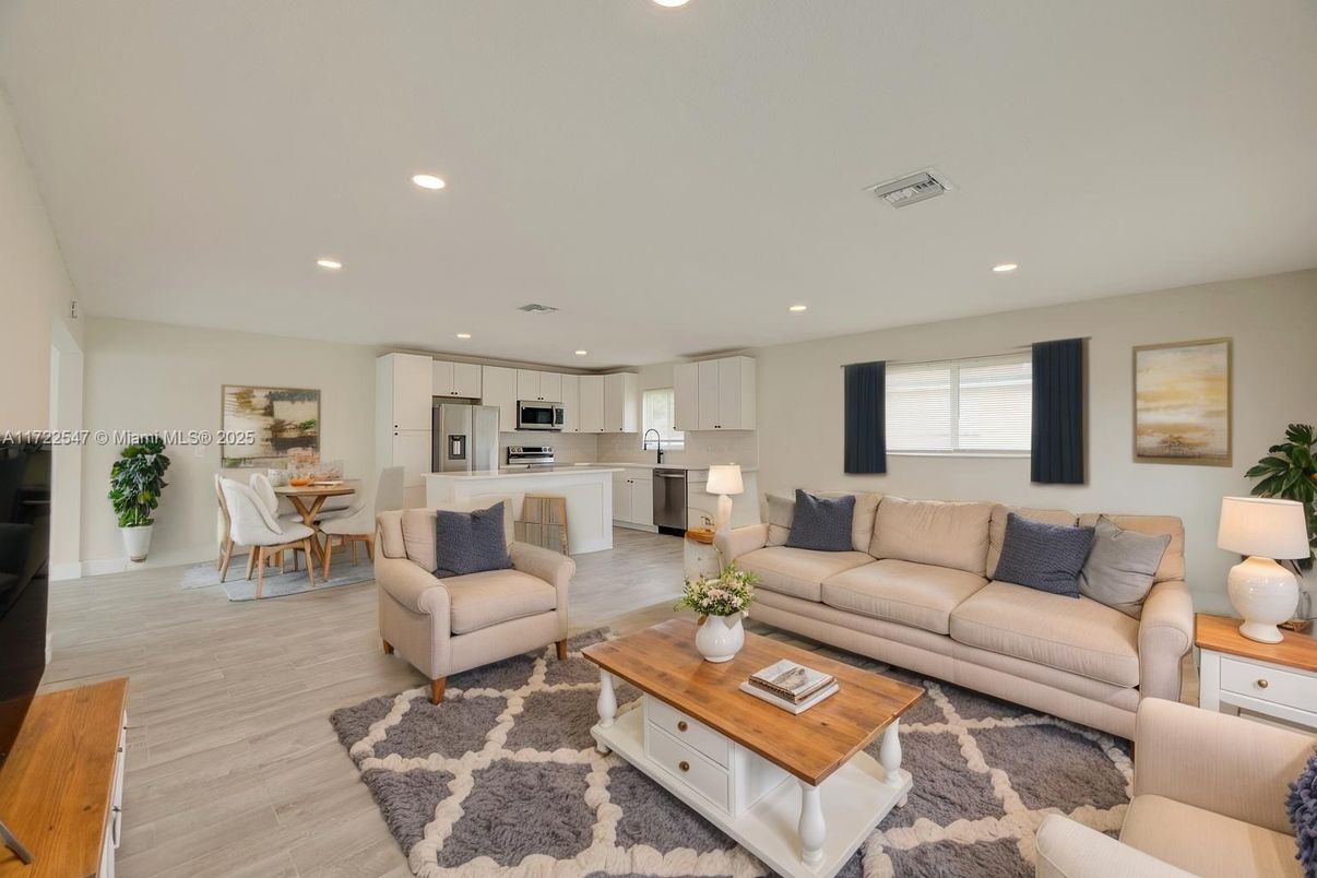 Dining room, Interior, Kitchen, Living room, Recessed Lighting, Stainless Steel Appliances, Wood Texture Flooring