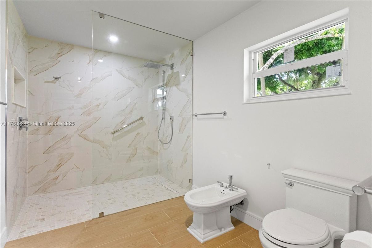 Bathroom, Glass Shower, Interior, Marble Walls, Recessed Lighting, Wood Texture Flooring