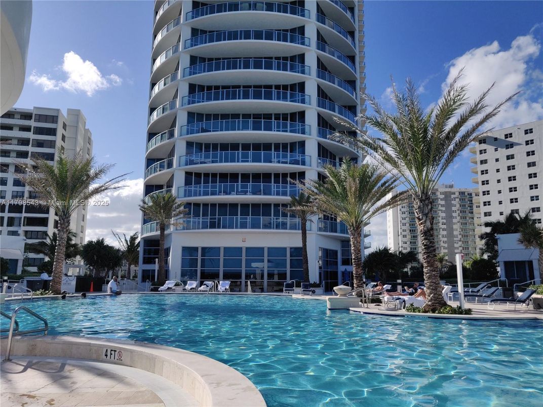Exterior, Facade, Pool, Condo Building