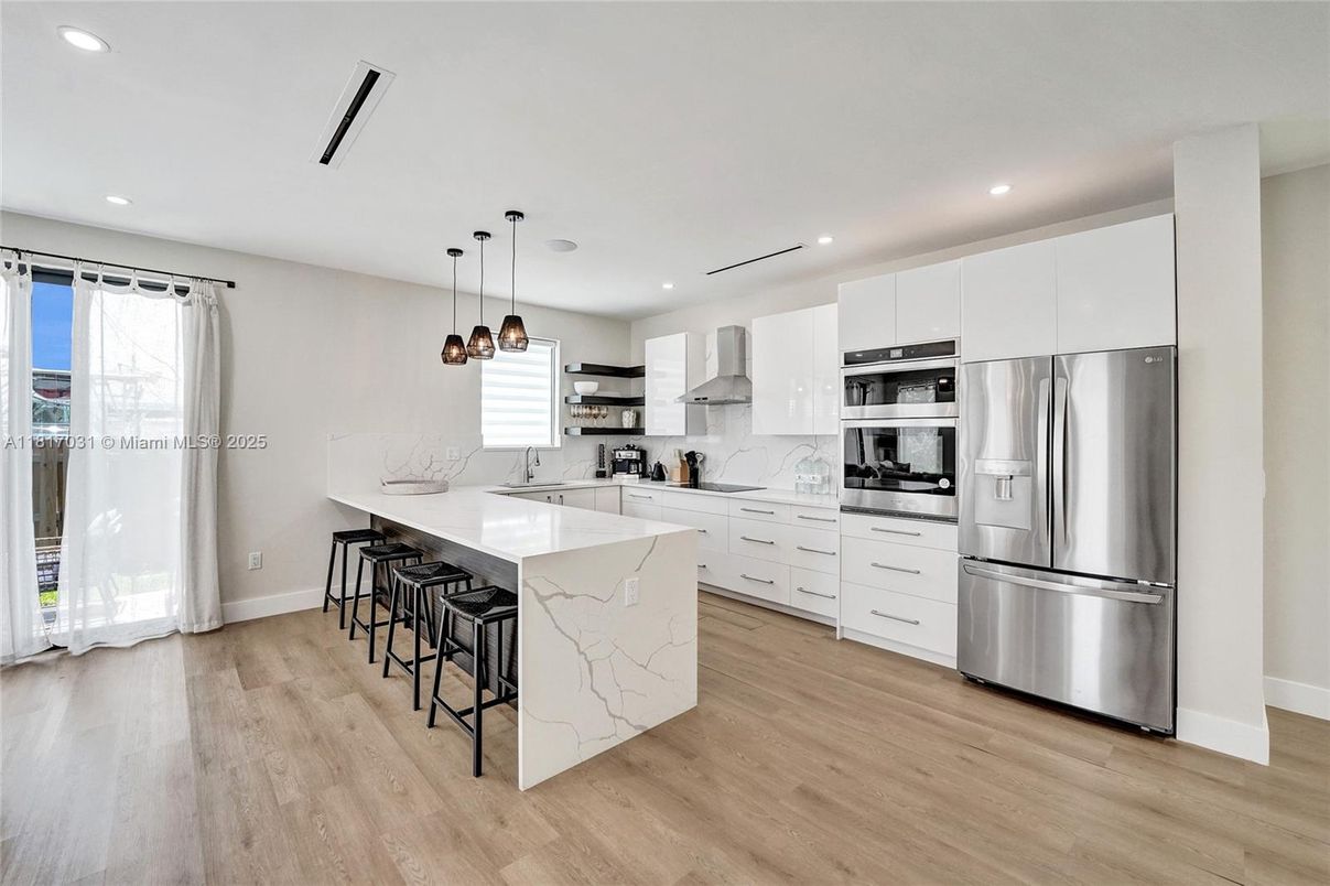 Interior, Kitchen, Pendant Lights, Recessed Lighting, Stainless Steel Appliances, Wood Texture Flooring