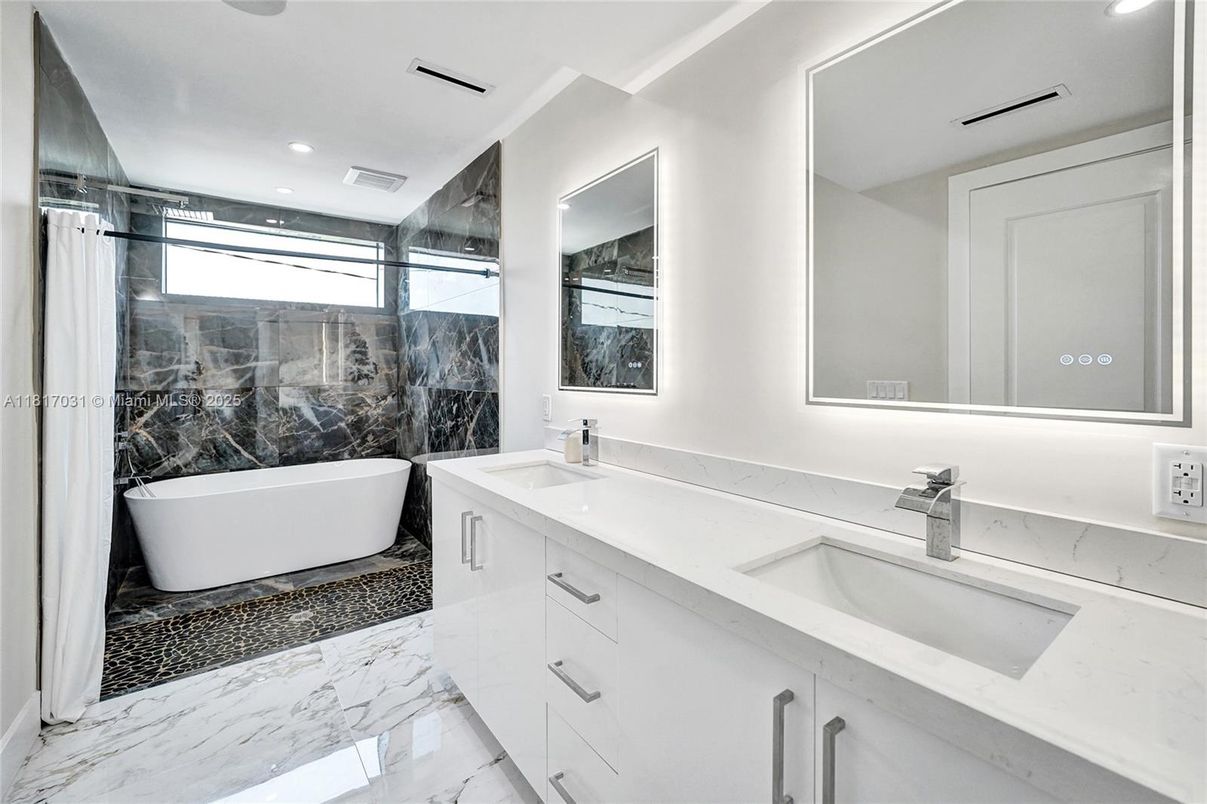 Bathroom, Dual Sink Vanities, Free Standing Baths, Interior, Marble, Marble Walls, Recessed Lighting