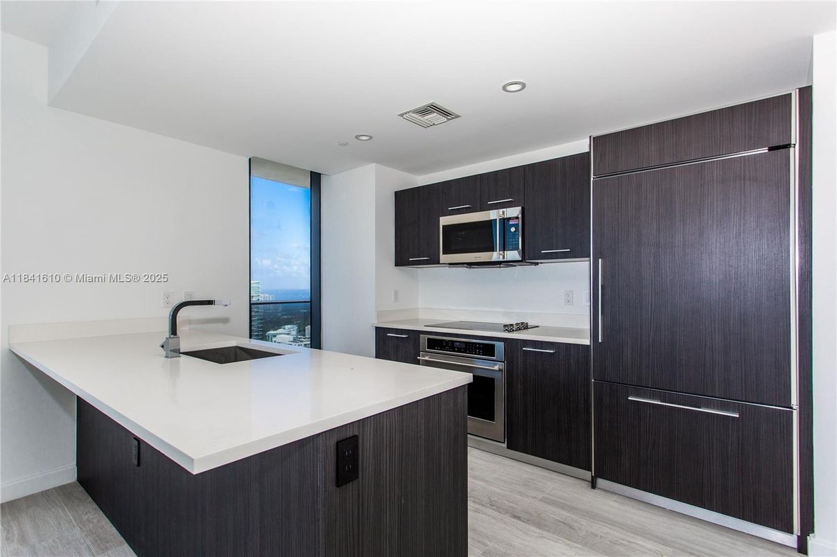 Interior, Kitchen, Recessed Lighting, Stainless Steel Appliances, Water, Wood Texture Flooring