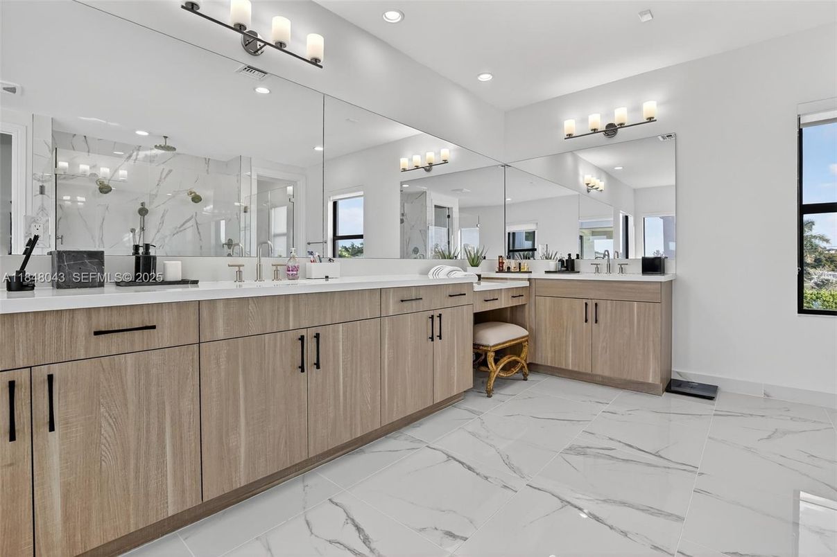Bathroom, Dual Sink Vanities, Glass Shower, Interior, Marble, Marble Walls, Recessed Lighting