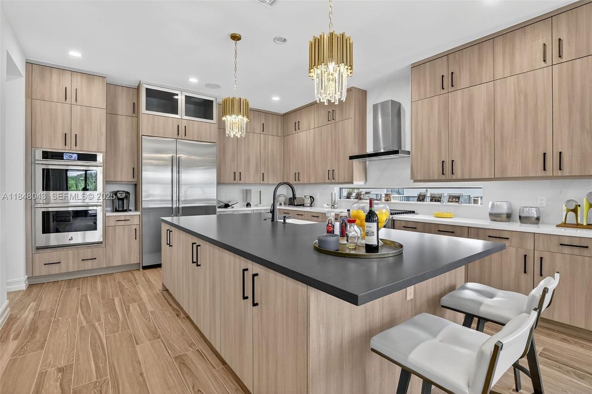 Chandelier, Interior, Kitchen, Pendant Lights, Recessed Lighting, Stainless Steel Appliances, Wood Texture Flooring