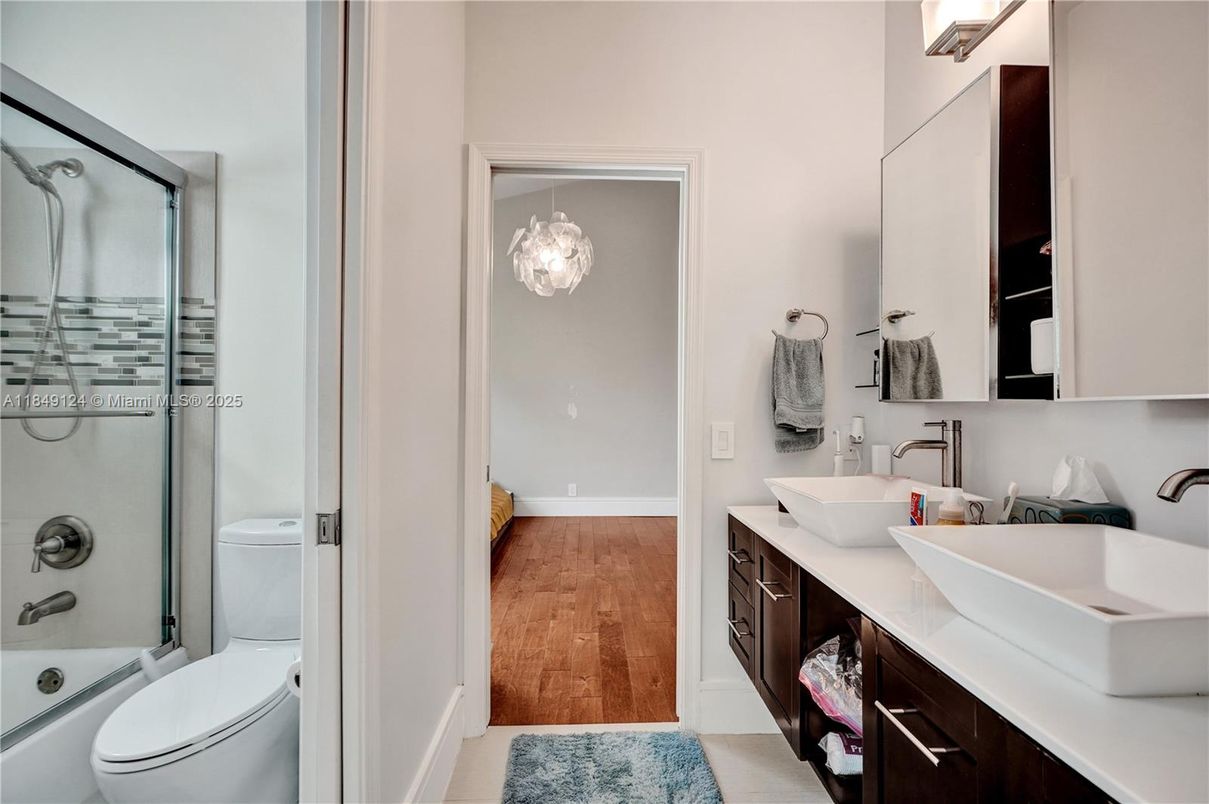 Bathroom, Dual Sink Vanities, Glass Shower, Interior, Wood Texture Flooring