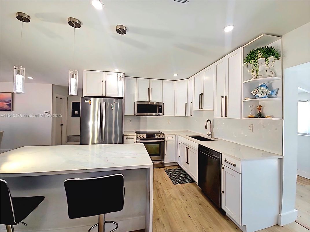 Interior, Kitchen, Pendant Lights, Recessed Lighting, Stainless Steel Appliances, Wood Texture Flooring