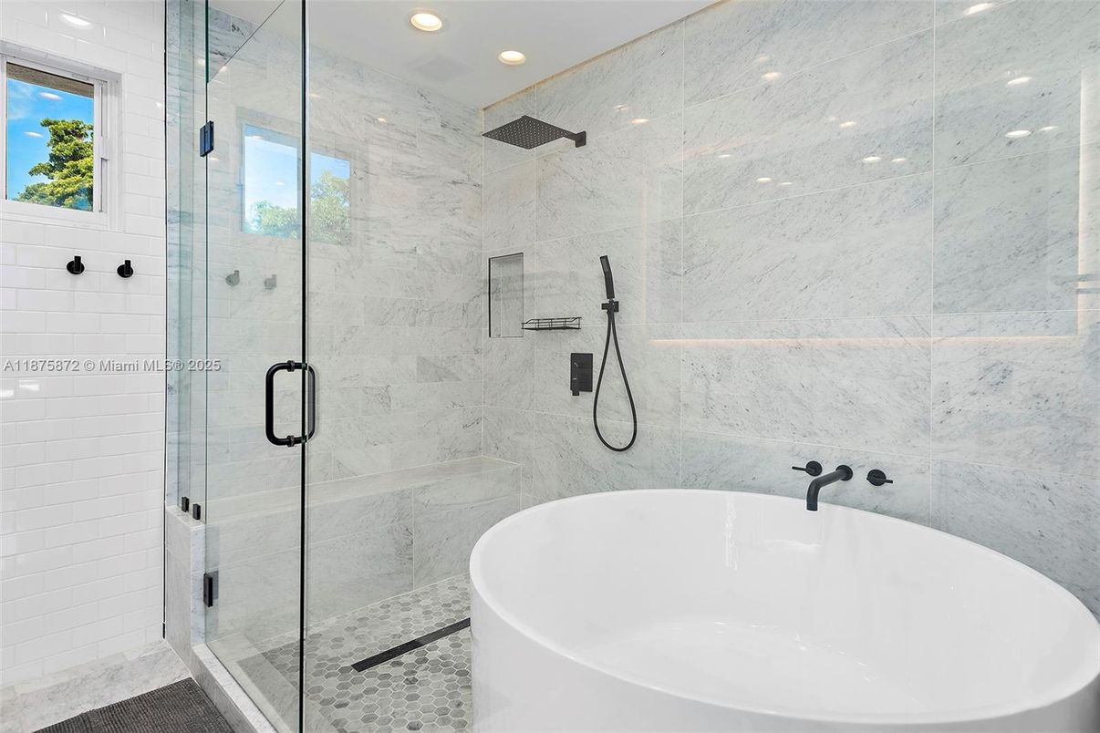 Bathroom, Free Standing Baths, Glass Shower, Interior, Marble Walls, Recessed Lighting