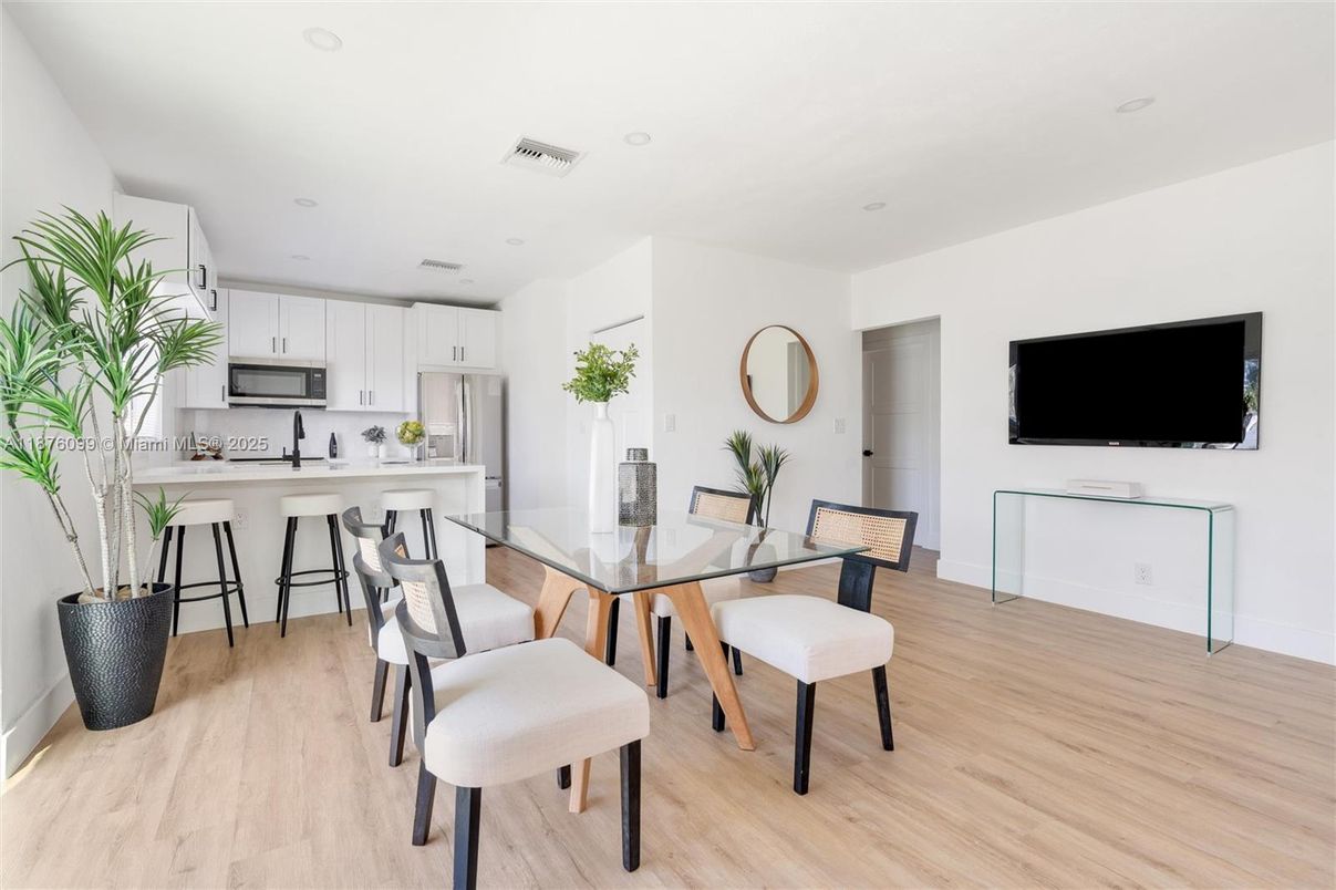 Dining room, Interior, Kitchen, Recessed Lighting, Stainless Steel Appliances, Wood Texture Flooring