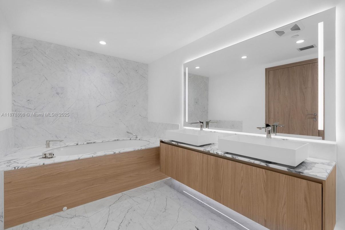 Bathroom, Dual Sink Vanities, Interior, Marble, Marble Walls, Recessed Lighting
