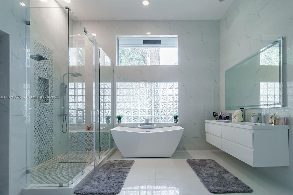 Bathroom, Free Standing Baths, Glass Shower, Interior, Marble Walls, Recessed Lighting