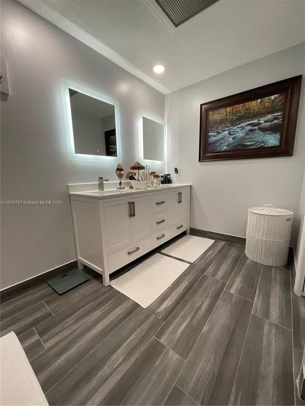 Bathroom, Dual Sink Vanities, Interior, Recessed Lighting, Wood Texture Flooring
