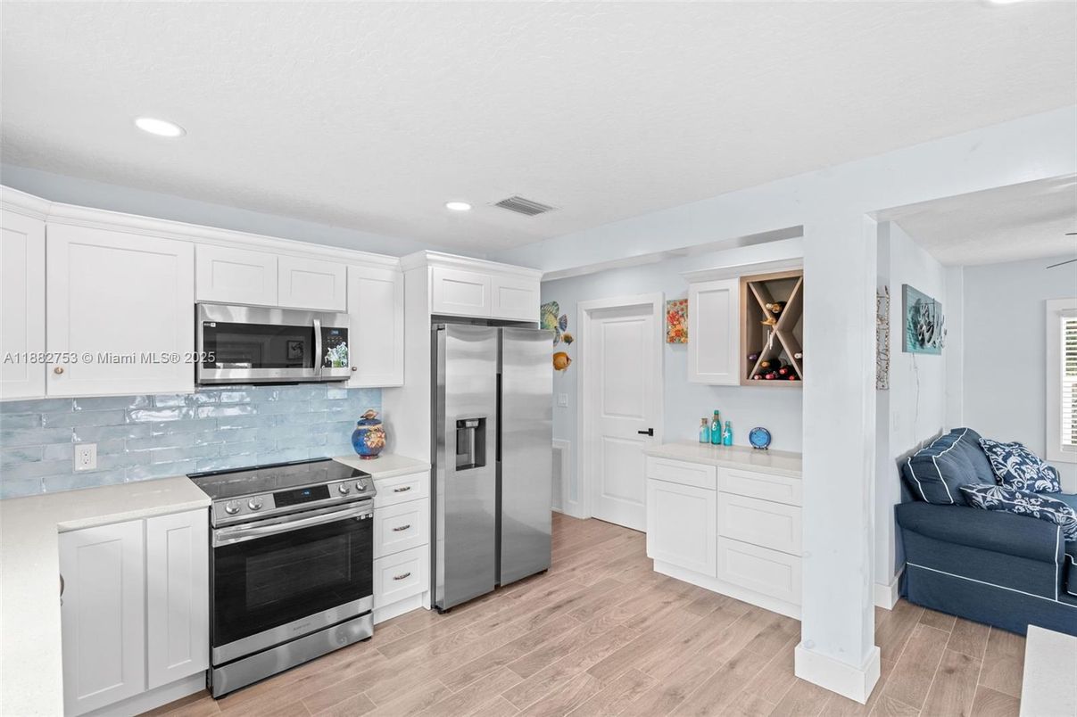 Interior, Kitchen, Recessed Lighting, Stainless Steel Appliances, Wood Texture Flooring