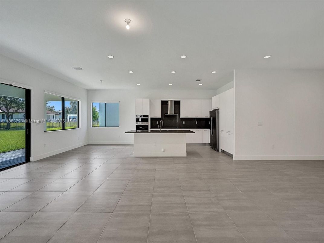 Empty room, Interior, Kitchen, Recessed Lighting, Stainless Steel Appliances