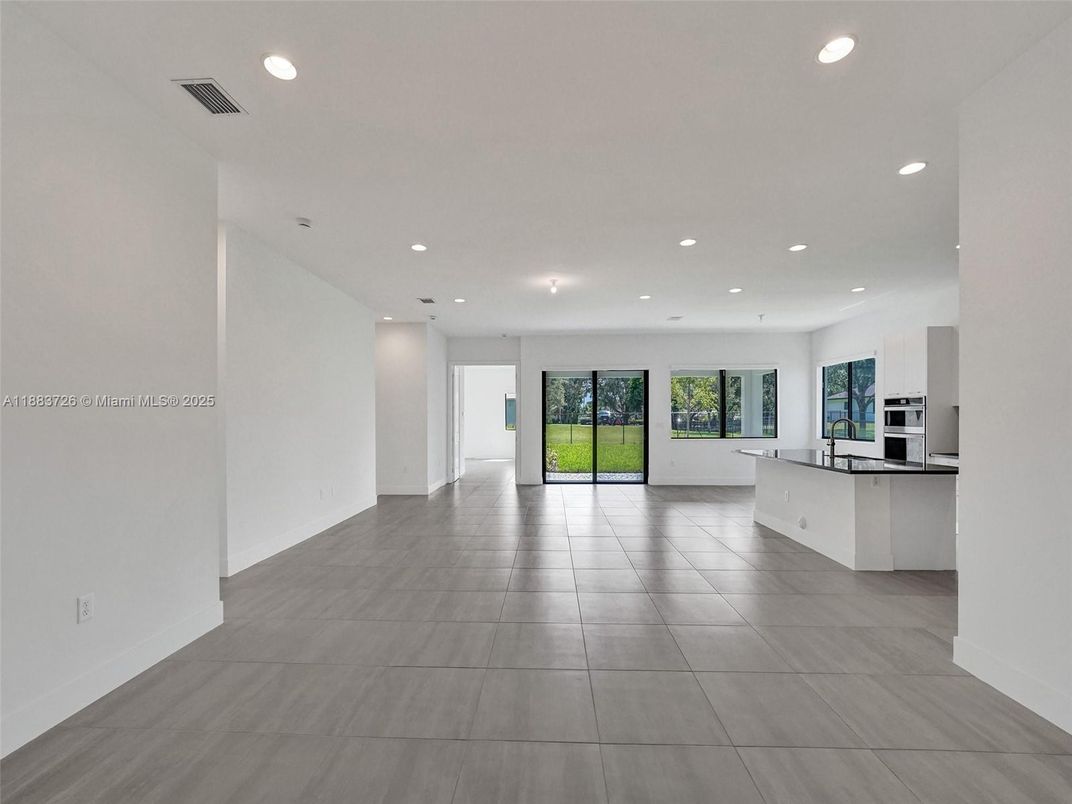 Empty room, Interior, Kitchen, Recessed Lighting, Stainless Steel Appliances