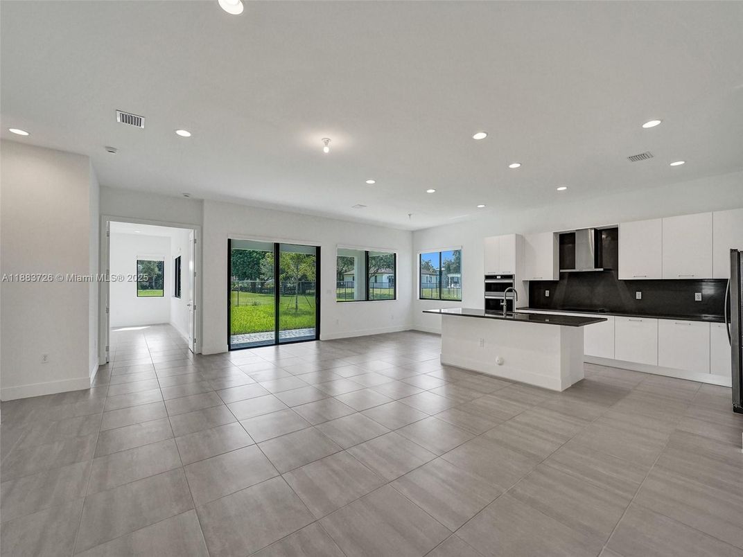 Empty room, Interior, Kitchen, Recessed Lighting, Stainless Steel Appliances