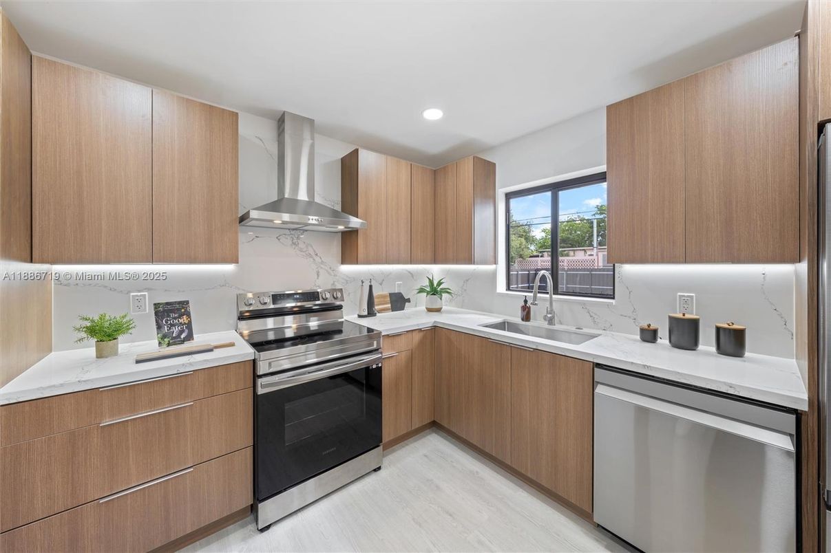 Interior, Kitchen, Marble Walls, Recessed Lighting, Stainless Steel Appliances, Wood Texture Flooring