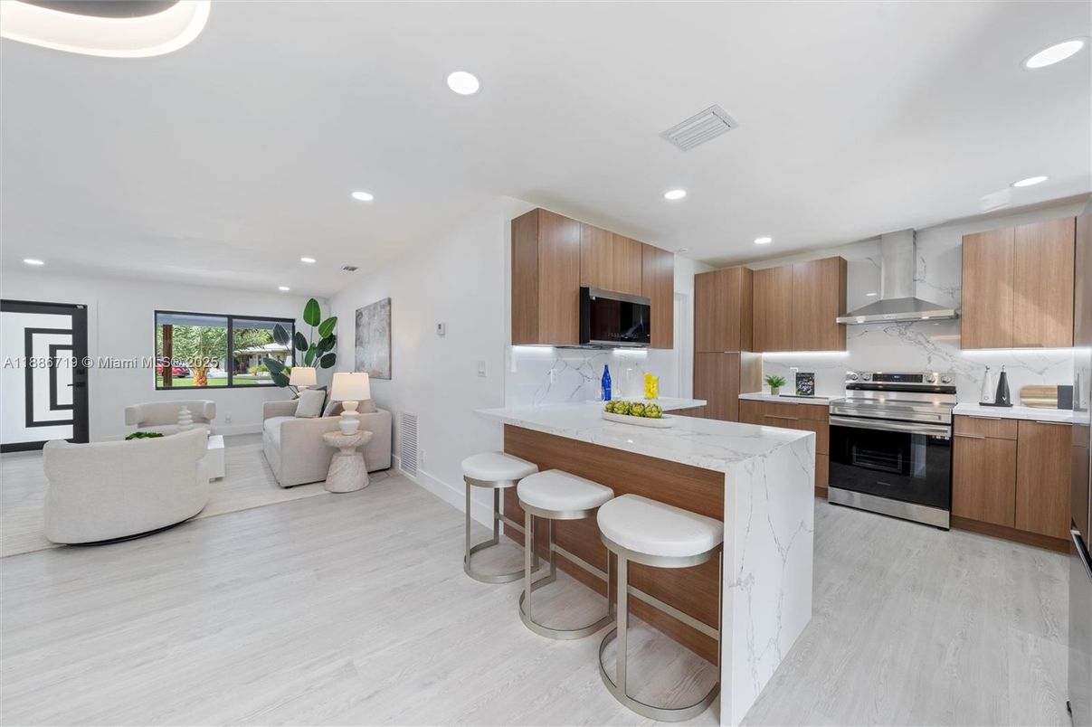 Interior, Kitchen, Living room, Marble Walls, Recessed Lighting, Stainless Steel Appliances, Wood Texture Flooring