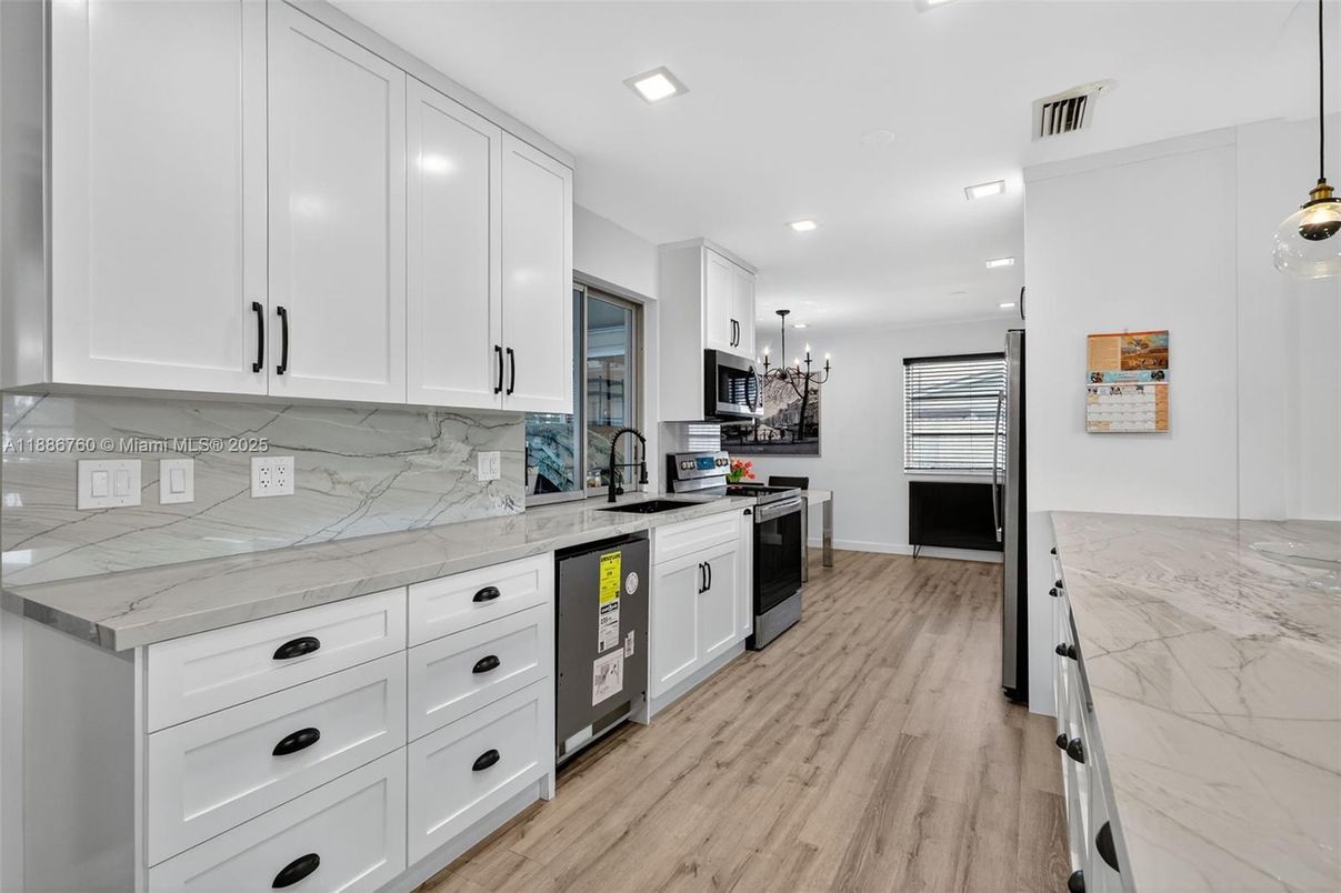 Interior, Kitchen, Pendant Lights, Recessed Lighting, Stainless Steel Appliances, Wood Texture Flooring
