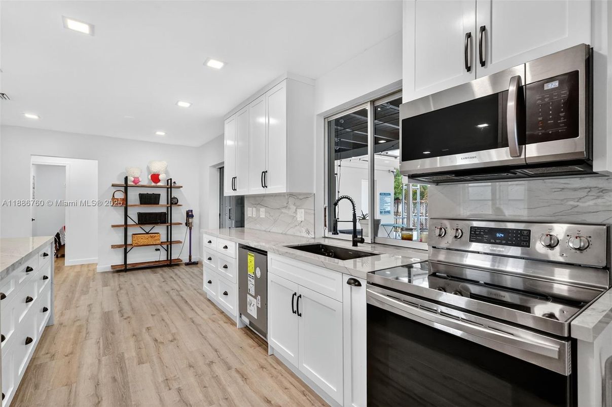 Interior, Kitchen, Recessed Lighting, Stainless Steel Appliances, Wood Texture Flooring